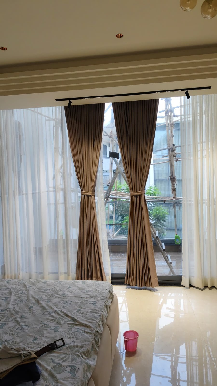 Designer curtains with sheers, tied back